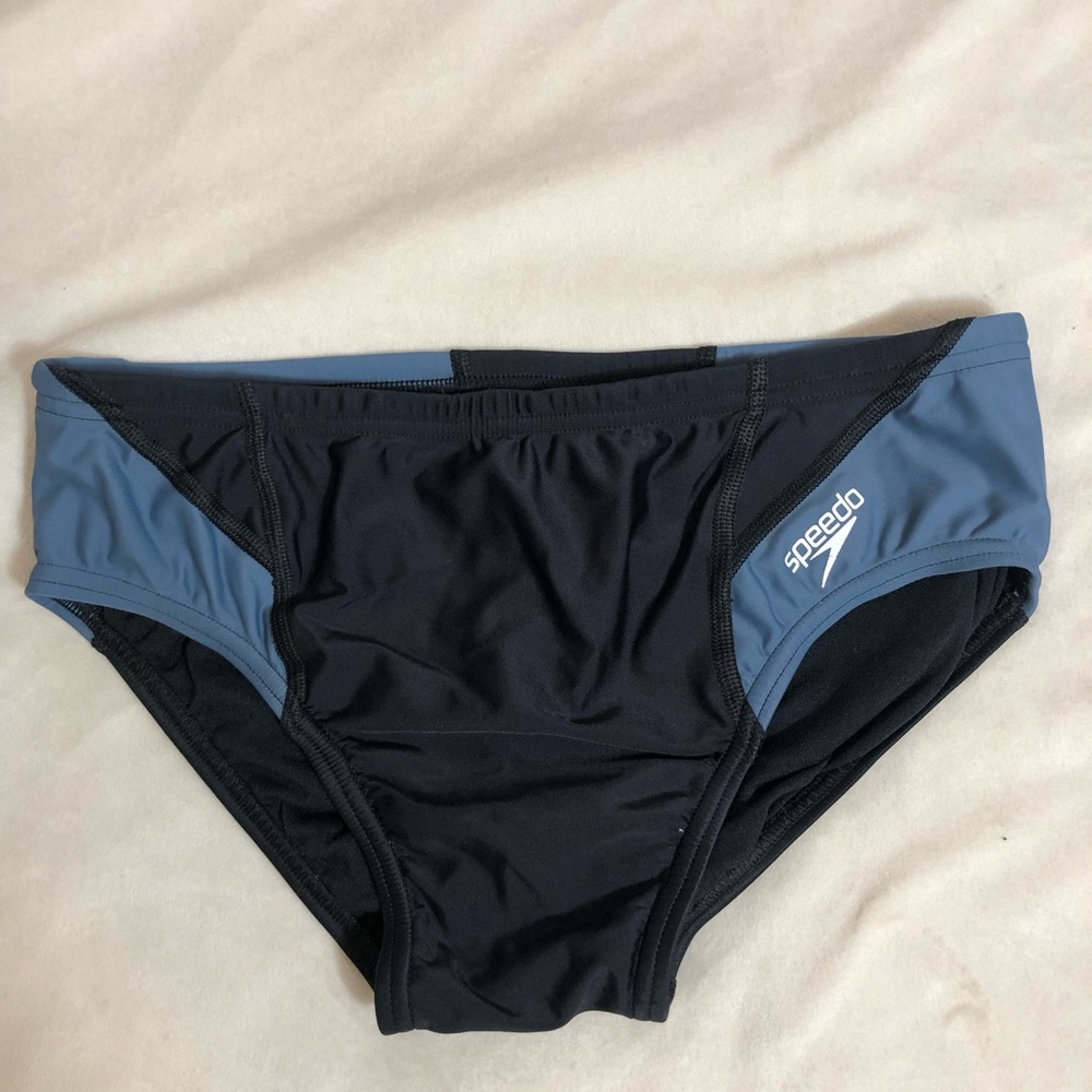 Blue and black Speedo polyester swim brief. Size 32